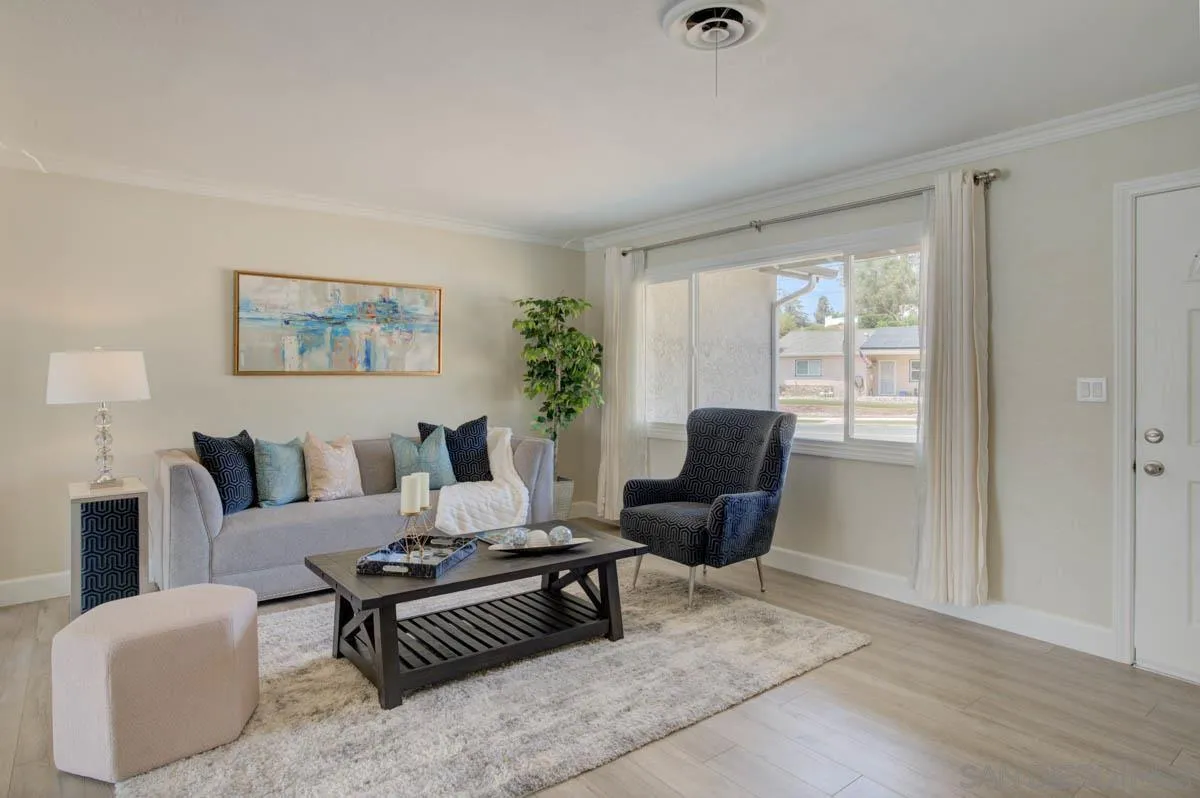9762 Domer Road Santee, CA 92071 - Photo 11 of 34 a living room with furniture and a large window