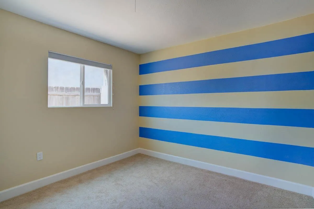 9762 Domer Road Santee, CA 92071 - Photo 17 of 34 a room with a window and a fireplace