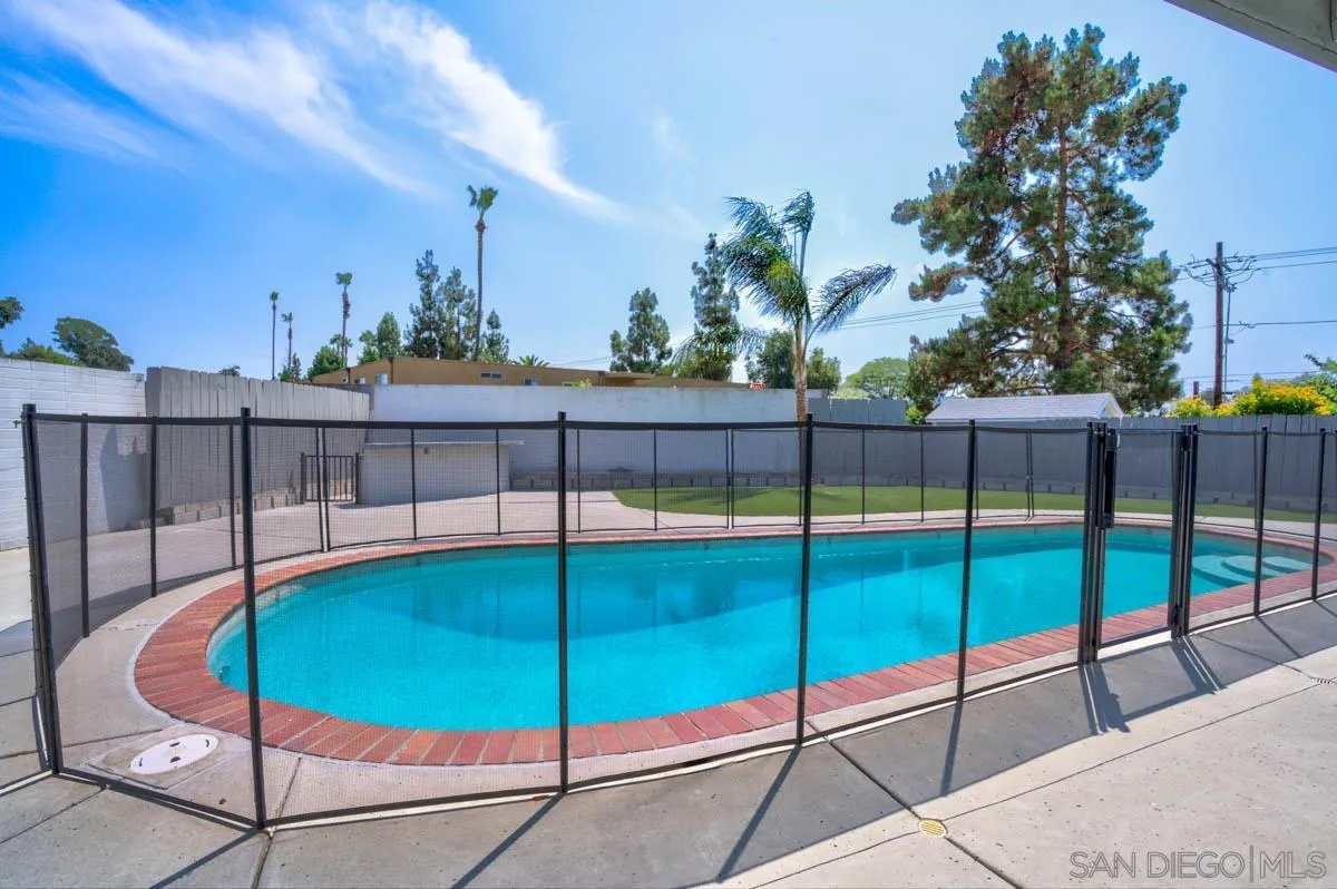 9762 Domer Road Santee, CA 92071 - Photo 20 of 34 a view of a swimming pool with an outdoor seating
