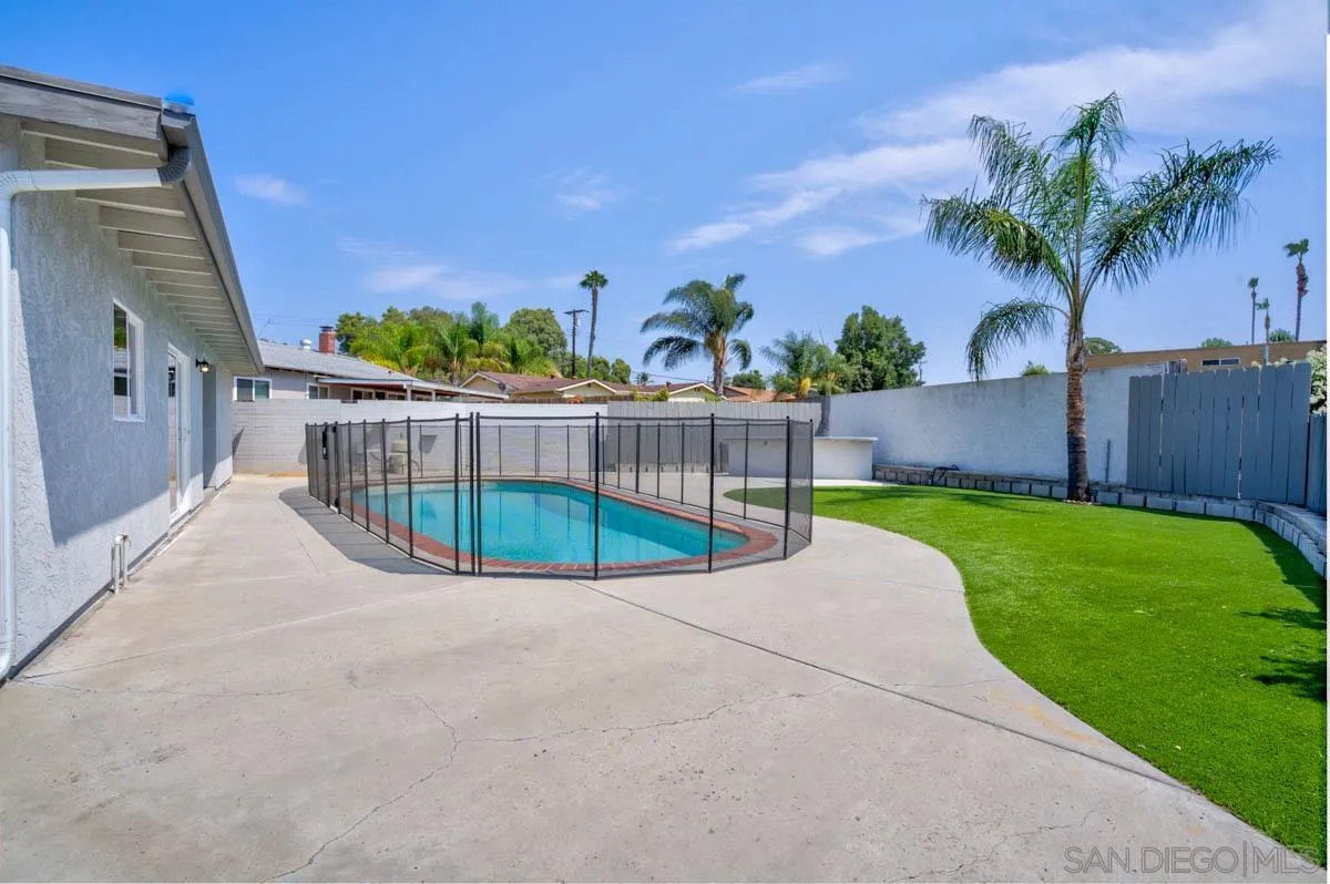9762 Domer Road Santee, CA 92071 - Photo 27 of 34 a view of a backyard with a garden