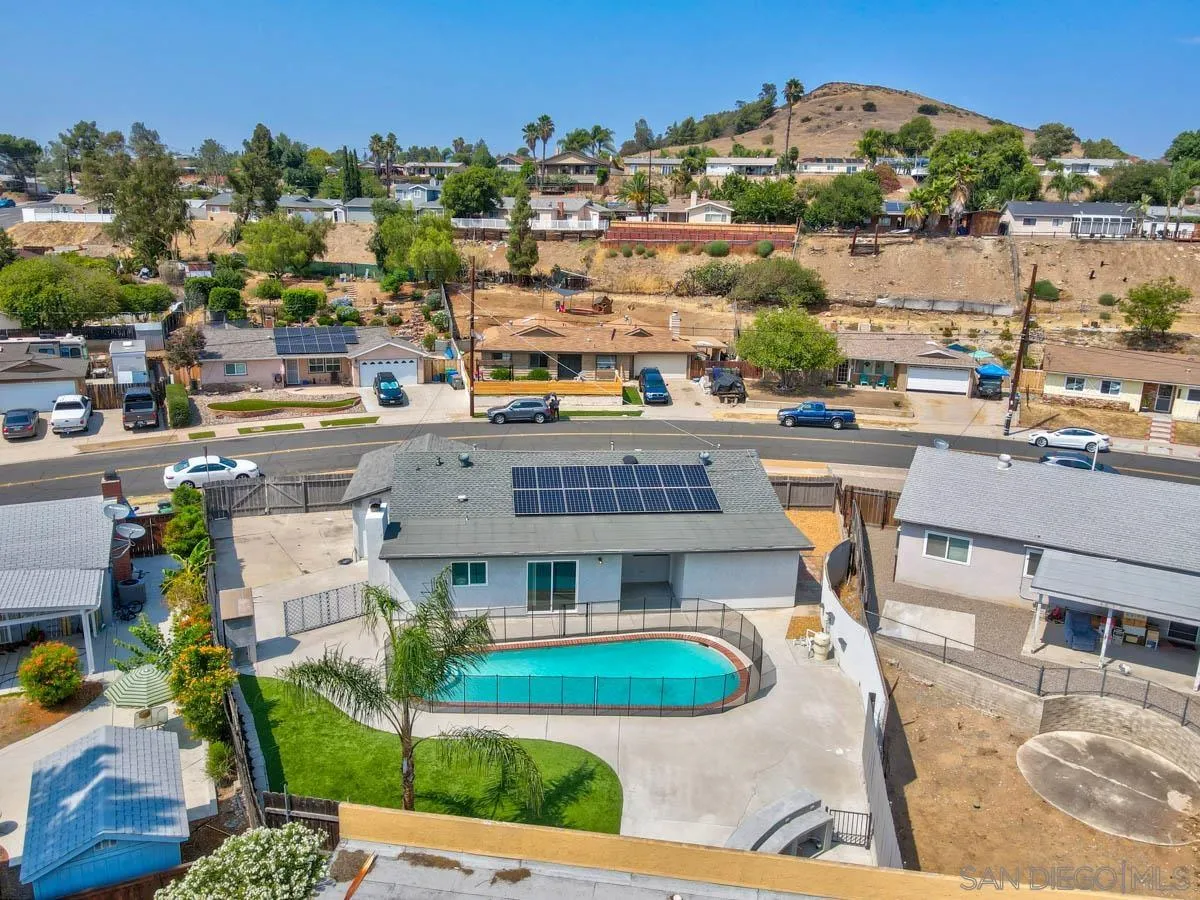 9762 Domer Road Santee, CA 92071 - Photo 31 of 34 a view of multiple houses with a yard