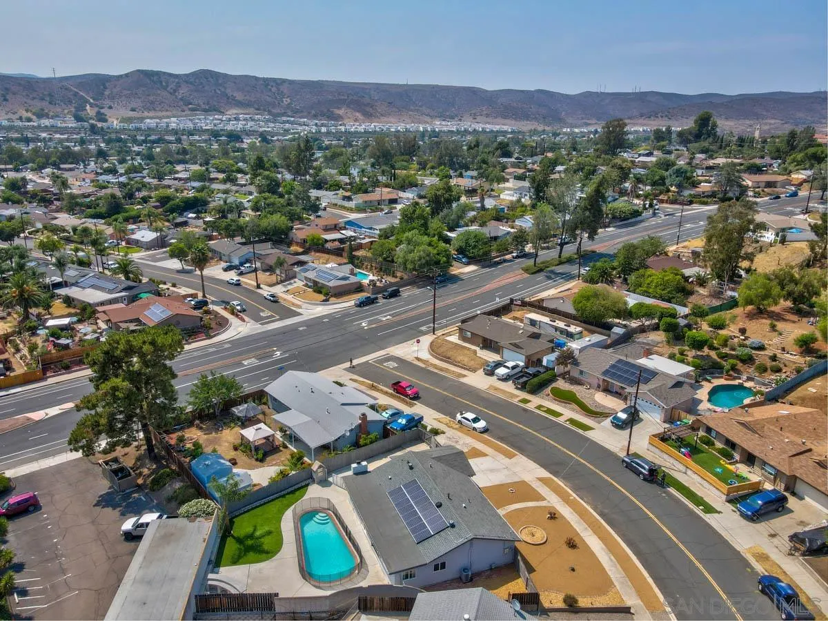 9762 Domer Road Santee, CA 92071 - Photo 32 of 34 an aerial view of a city with lots of residential buildings