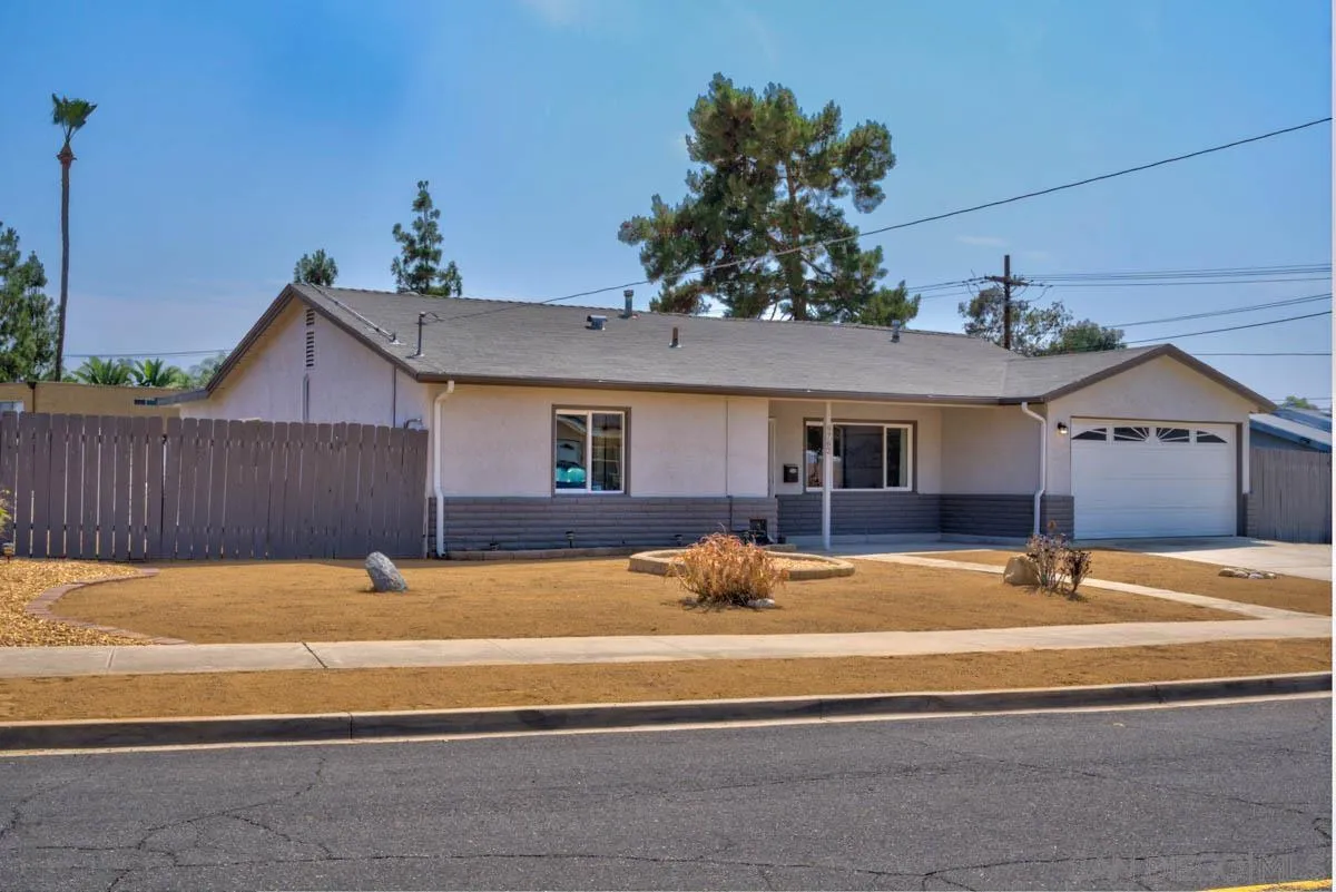 9762 Domer Road Santee, CA 92071 - Photo 34 of 34 a front view of a house with a yard