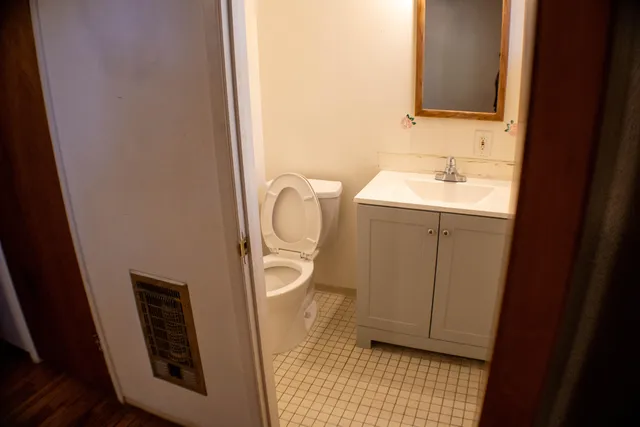 a bathroom with a sink and a toilet