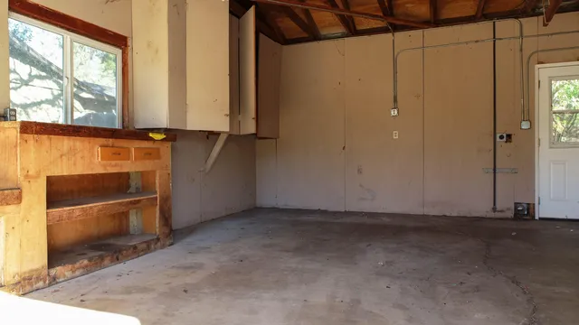 an empty room with windows