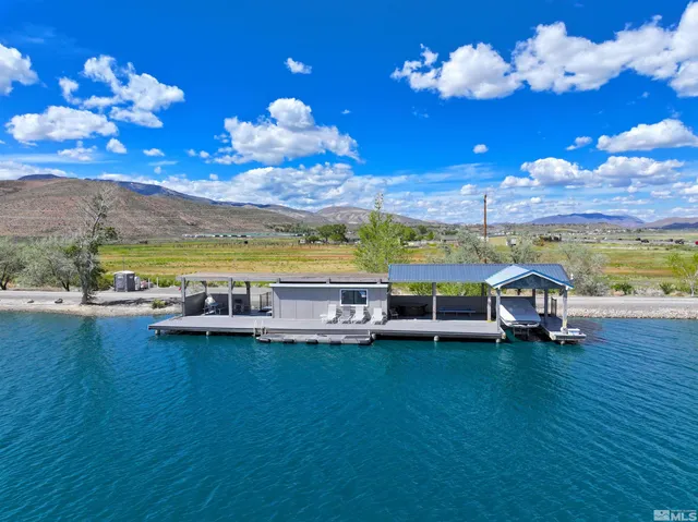 a view of a lake with mountains in the background