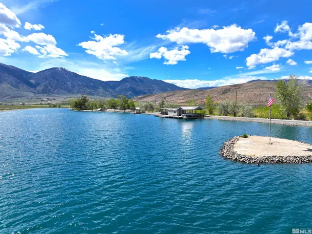 a view of a lake with sunset view