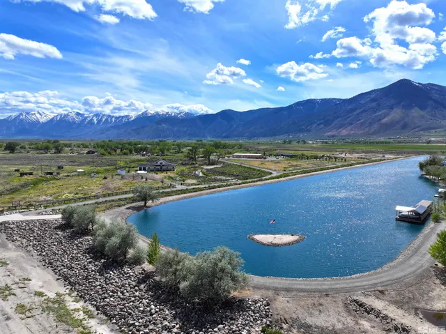 a view of a balcony with chairs