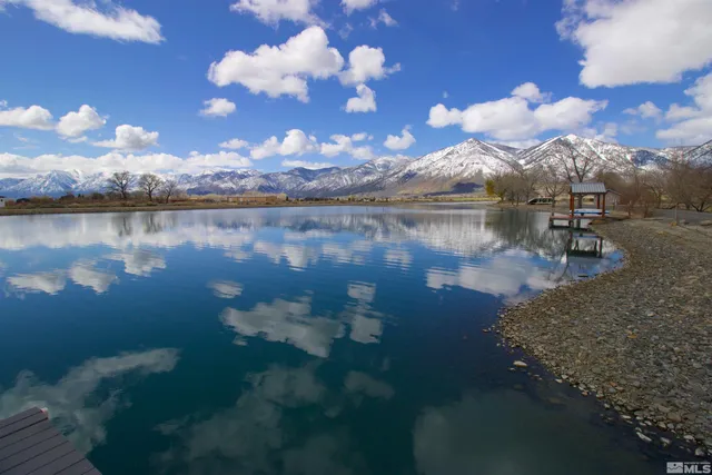 a sitting area with lake view