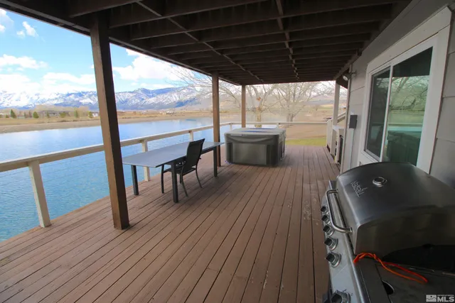 a view of balcony with wooden floor and outdoor space