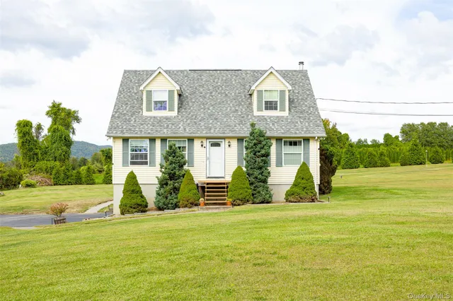 a view of a house with a swimming pool