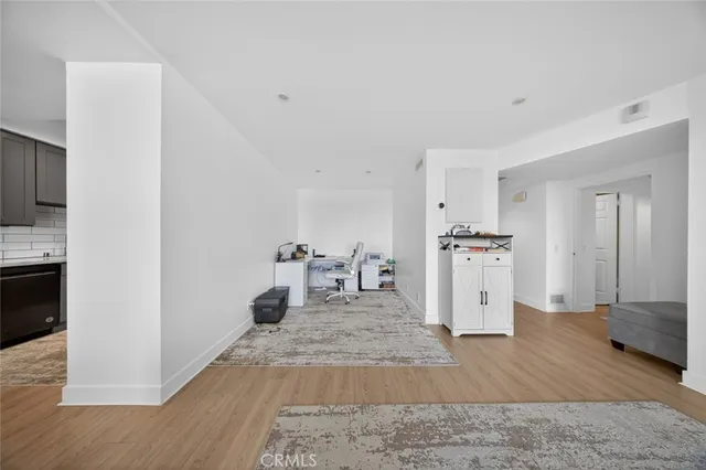 a kitchen with stainless steel appliances granite countertop lots of counter top space