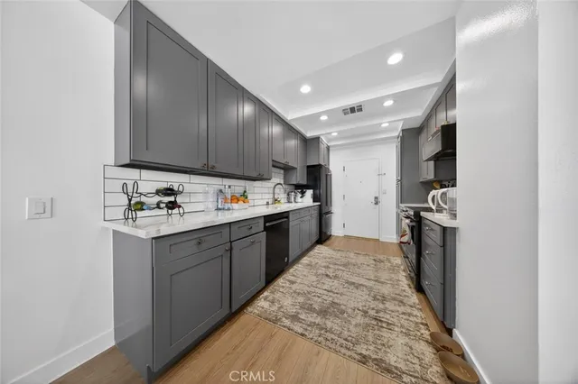 a view of a workspace with furniture