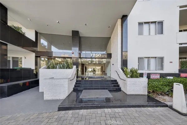 a view of a balcony with city view