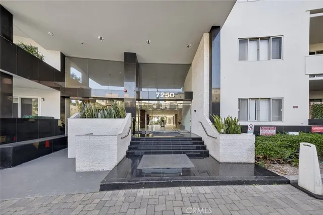 a view of a balcony with city view