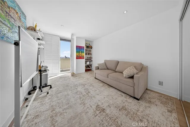 a view of a hallway with washer and dryer