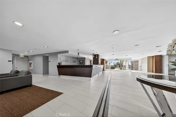 a view of a kitchen with a sink