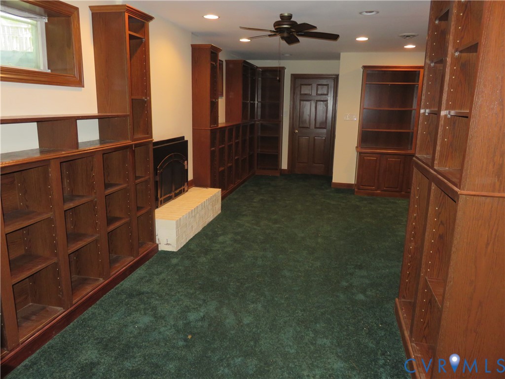8379 Quailfield Road Mechanicsville, VA 23116 - Photo 48 of 56 an empty room with wooden floor and closet