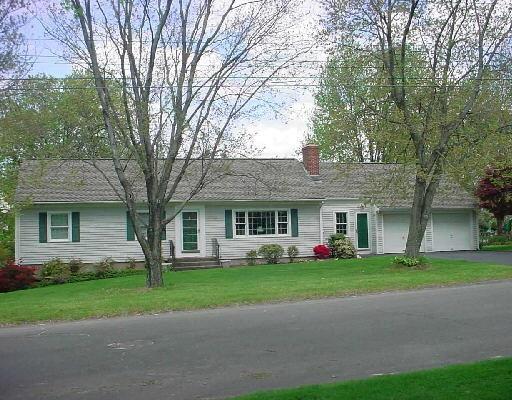 126 Ridgeview Avenue Trumbull, CT 06611 - Photo 1 of 1 a front view of house with yard and green space