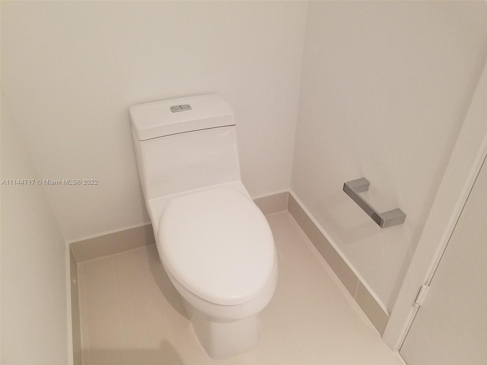 45 Southwest 9th Street, Unit 3103 Miami, FL 33130 - Photo 21 of 23 a close up view of a toilet