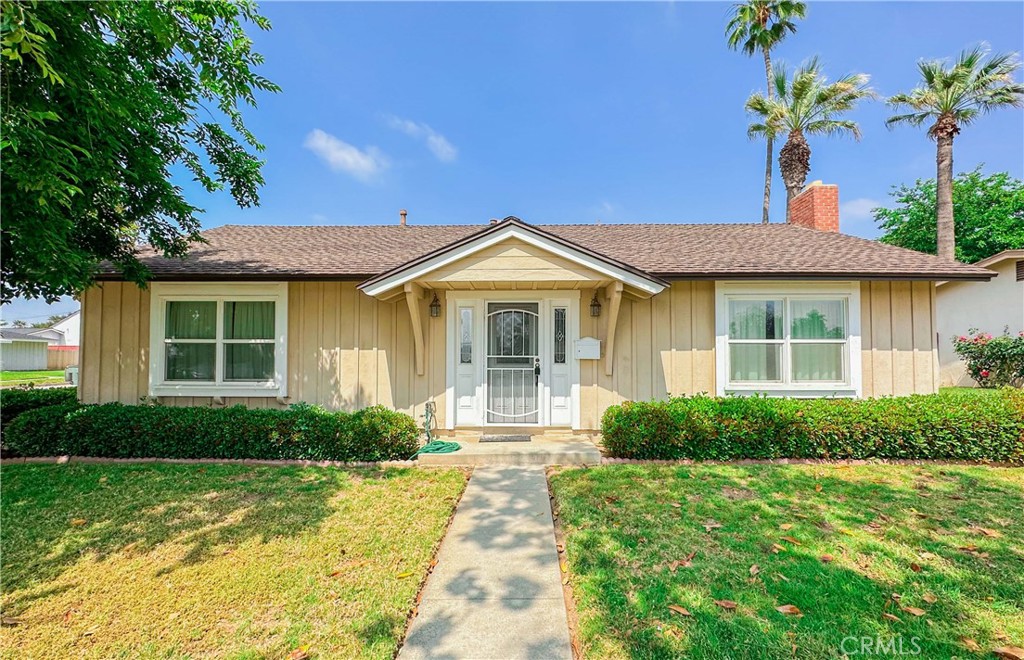 2965 Sandberg Street Riverside, CA 92506 - Photo 1 of 1 a front view of a house with garden