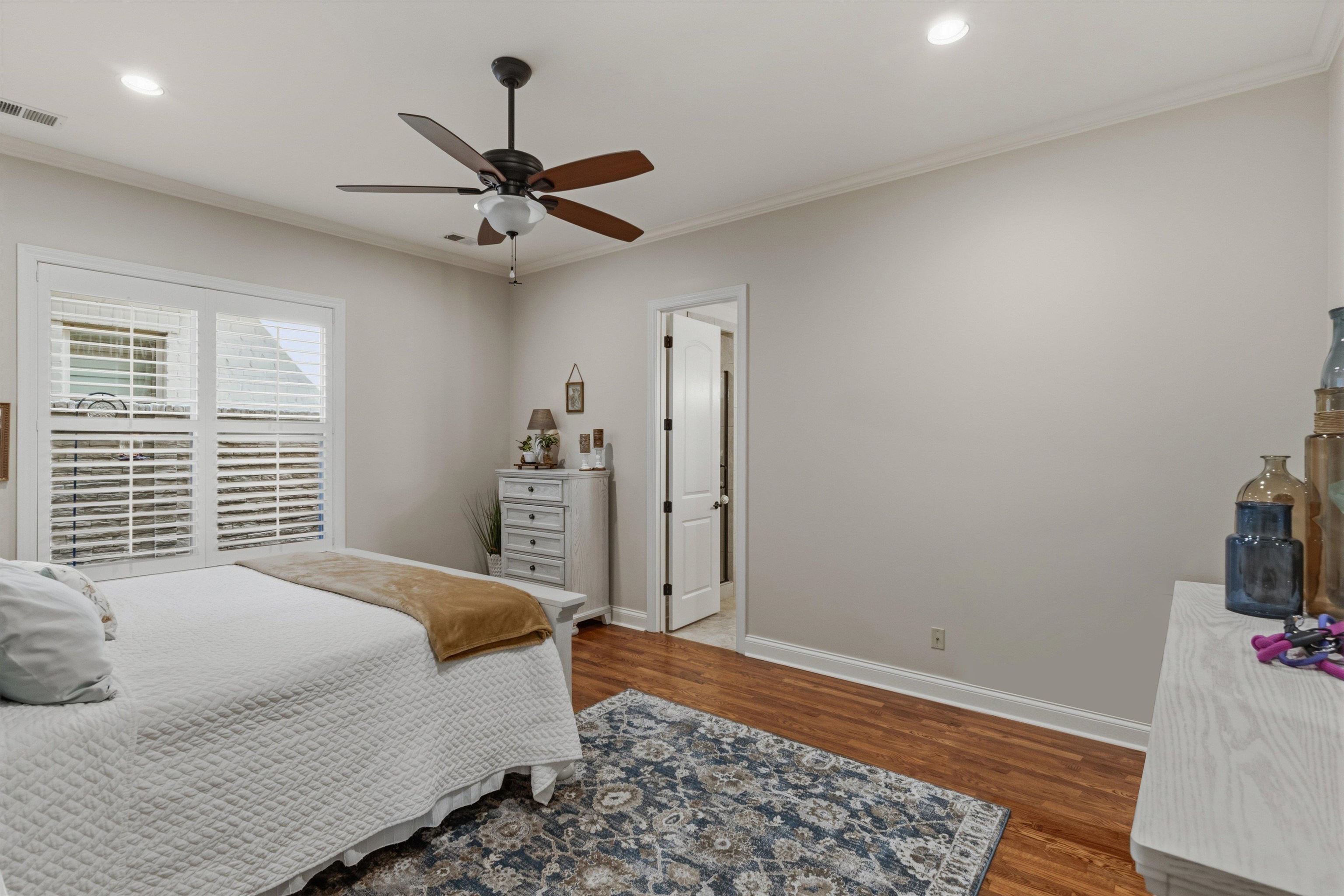 1011 Ostlers Way Collierville, TN 38017 - Photo 15 of 31 a bedroom with a bed and a window