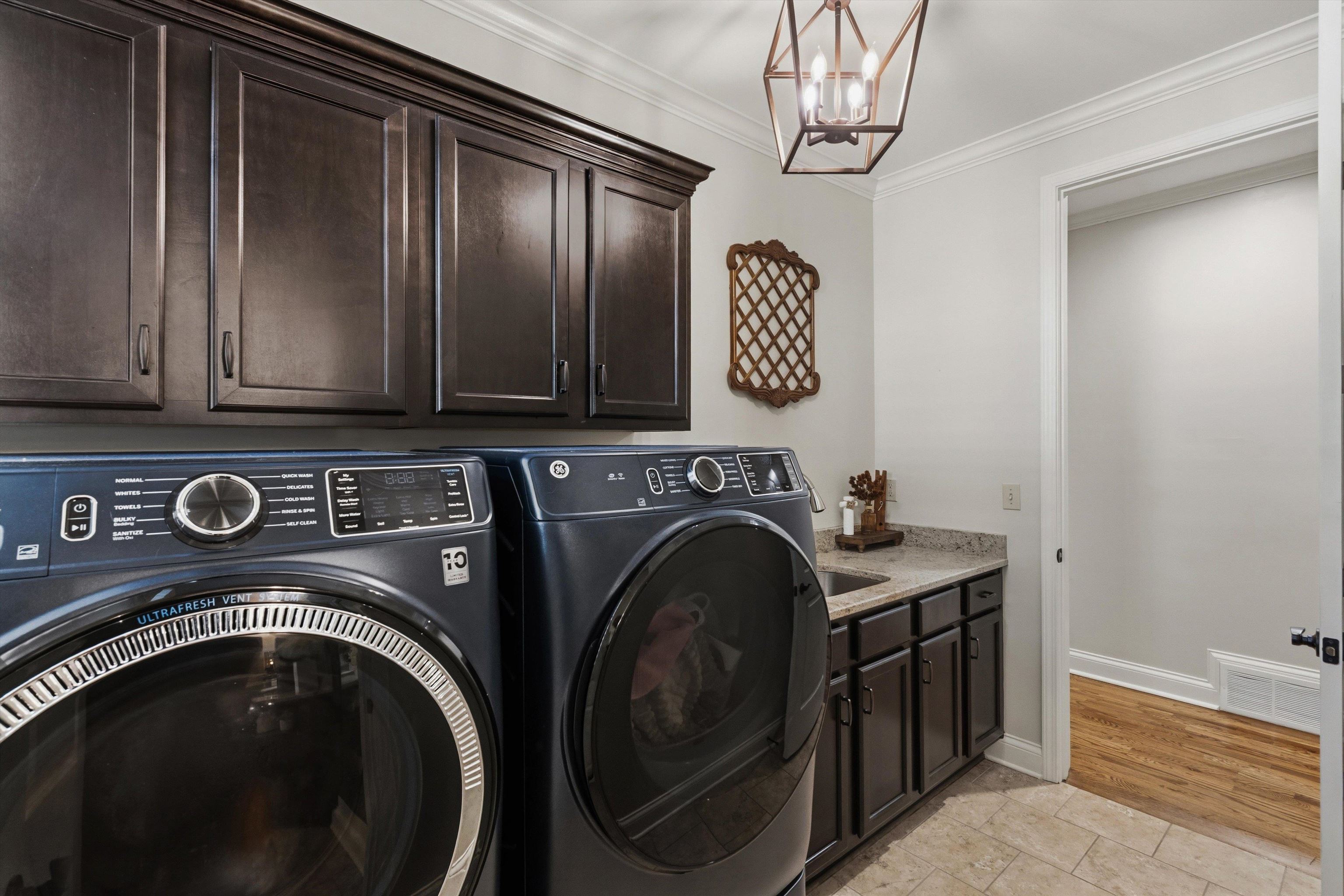 1011 Ostlers Way Collierville, TN 38017 - Photo 21 of 31 a utility room with dryer and washer