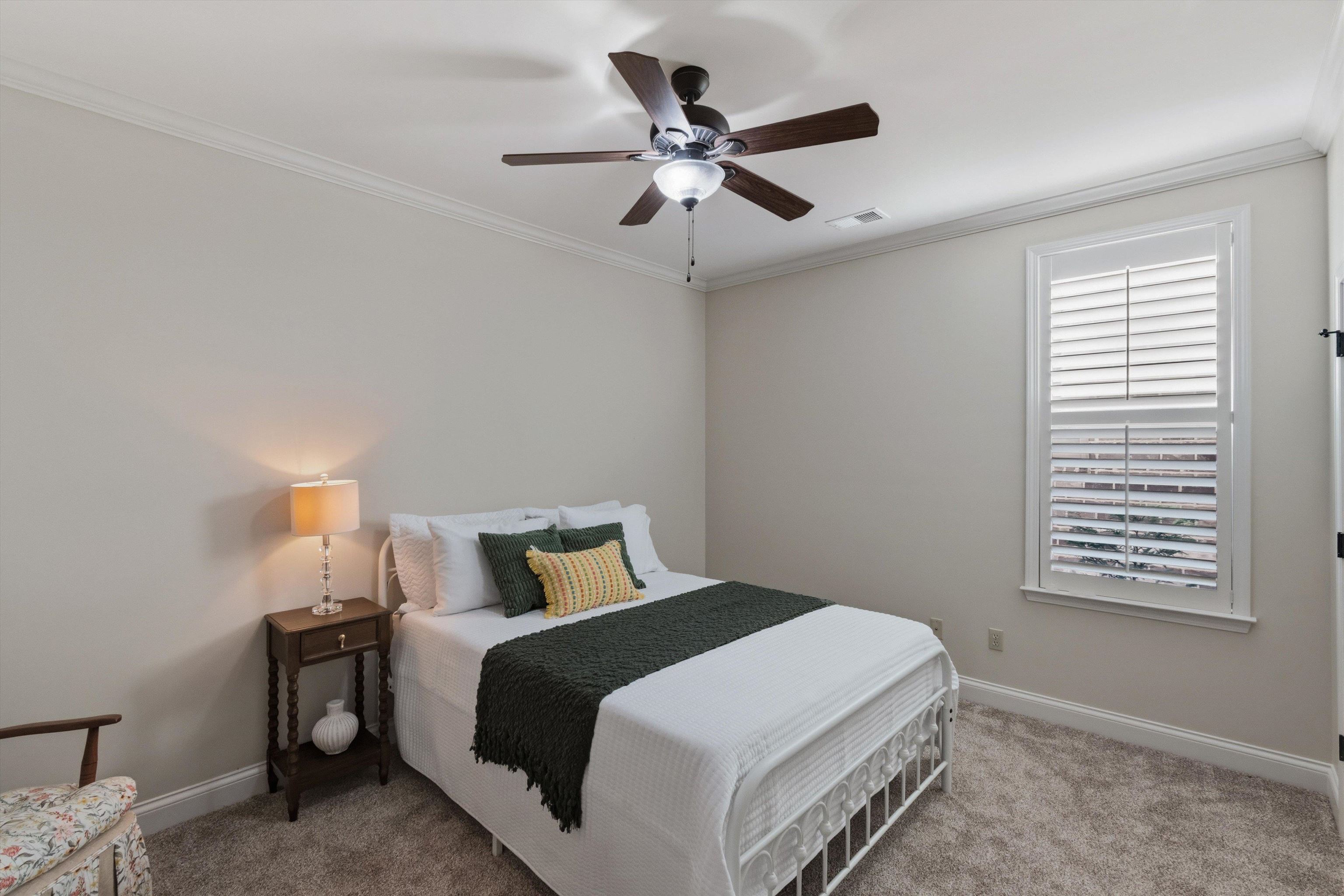 1011 Ostlers Way Collierville, TN 38017 - Photo 24 of 31 a bedroom with a bed and window