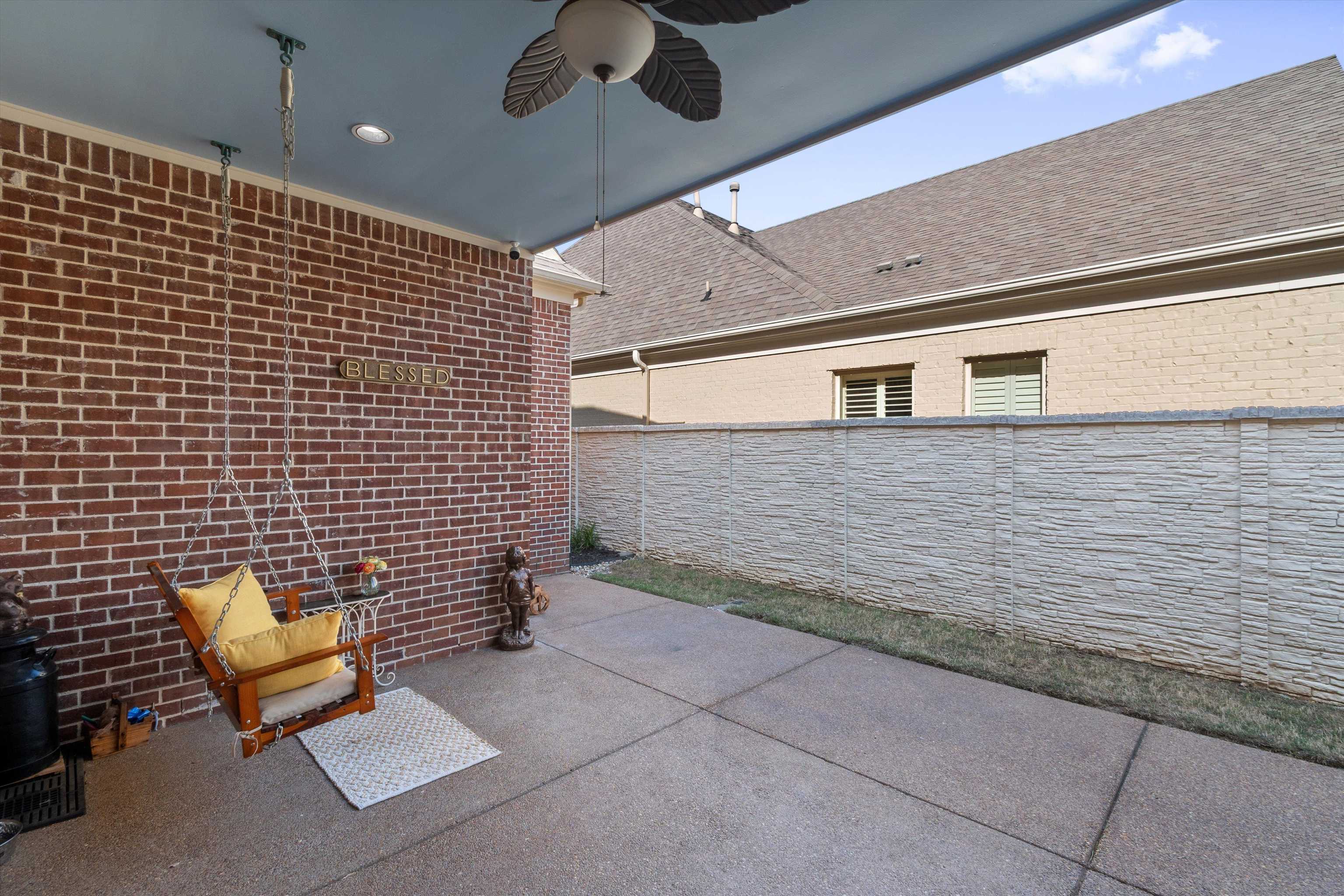1011 Ostlers Way Collierville, TN 38017 - Photo 26 of 31 a view of backyard with a chair and a barbeque