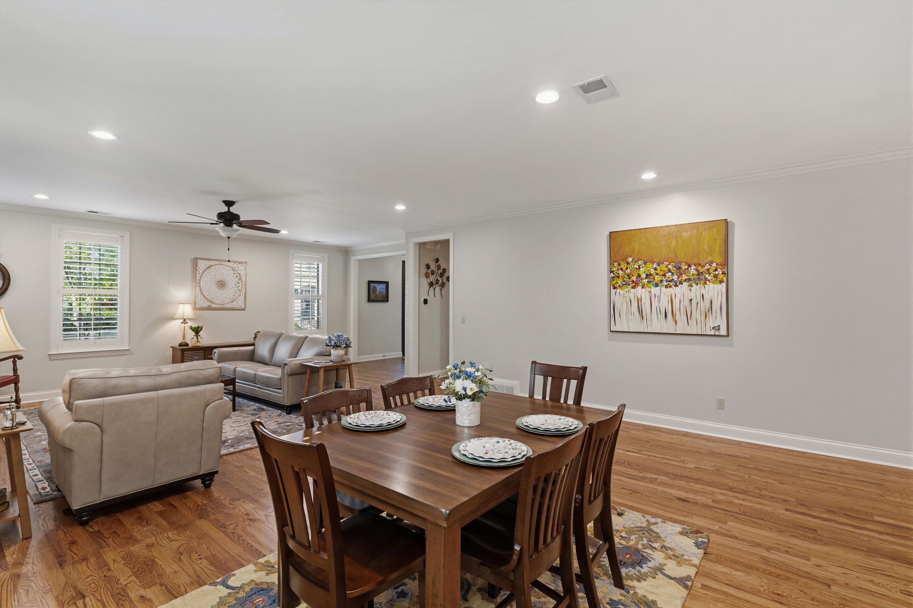 1011 Ostlers Way Collierville, TN 38017 - Photo 9 of 31 a view of a dining room with furniture window and wooden floor