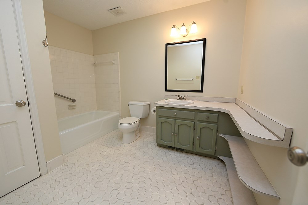 4305 Oak Park Road Raleigh, NC 27612 - Photo 13 of 18 This bathroom is located in the upstairs hallway. Bathroom