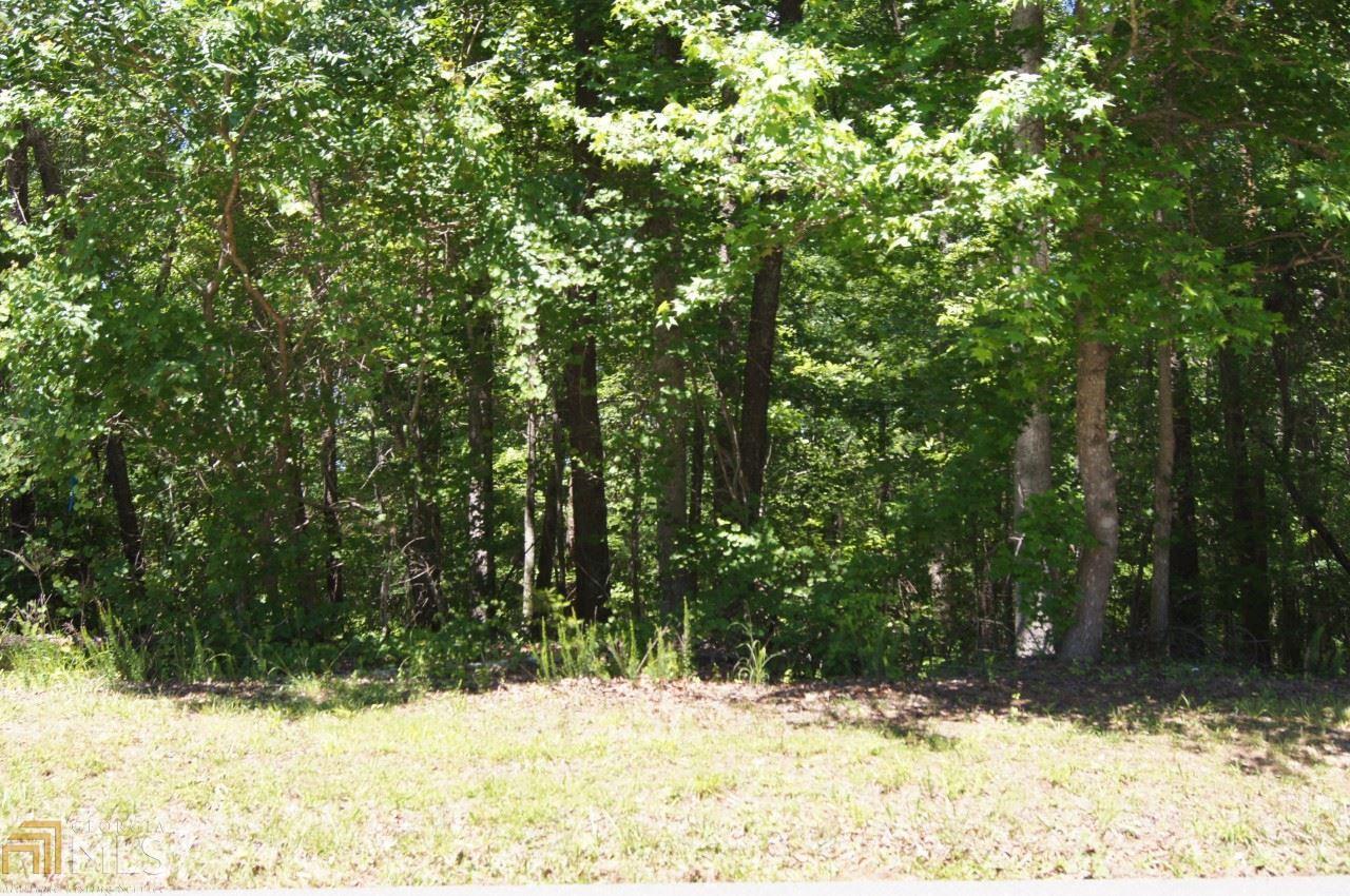 0 Calhoun Road, Unit 39 Dahlonega, GA 30533 - Photo 1 of 1 Easy access from Calhoun Road onto the lot. Mature hardwoods on the property.