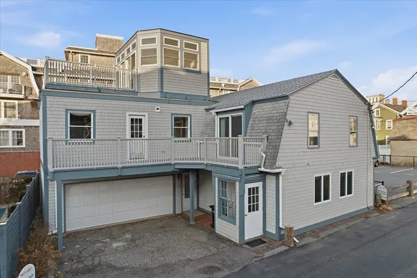 a front view of a house with a garage