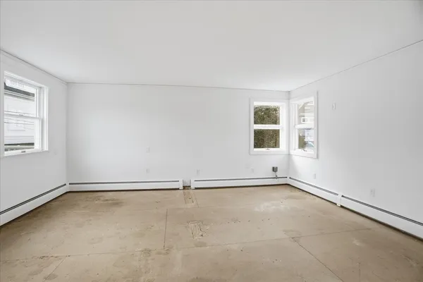 an empty room with windows