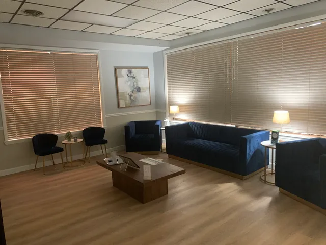 a vase of flowers sitting on a table