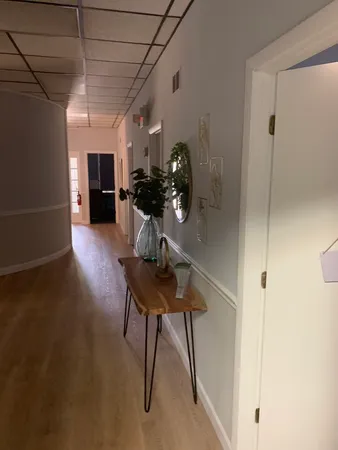 a view of living room with furniture and a couch