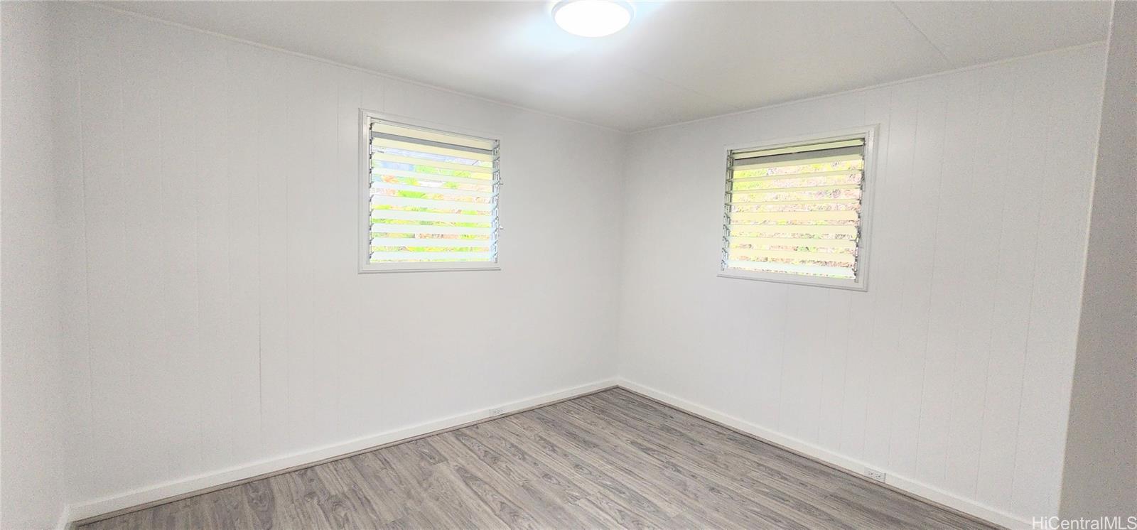 41-978B Waikupanaha Street, Unit B4 Waimanalo, HI 96795 - Photo 13 of 18 an empty room with a window