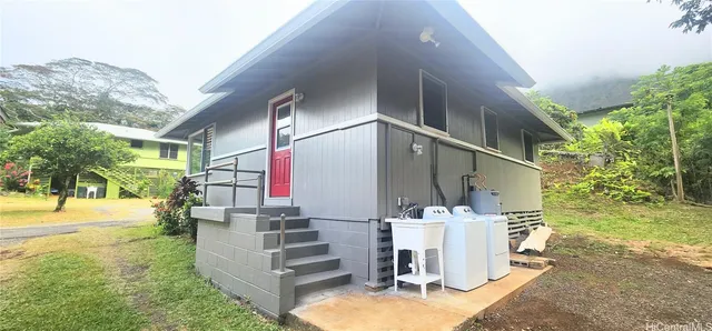 a view of a yard with furniture