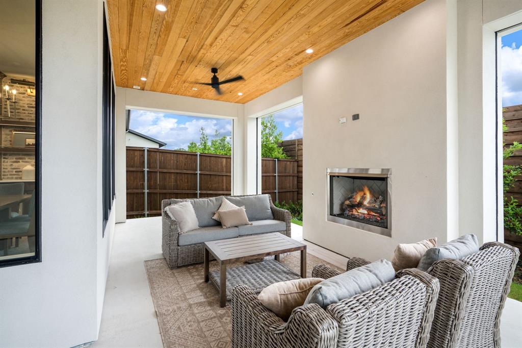 3304 Ferguson Road Grapevine, TX 76092 - Photo 37 of 38 Covered patio featuring a wood-panel ceiling with recessed lighting and a ceiling fan