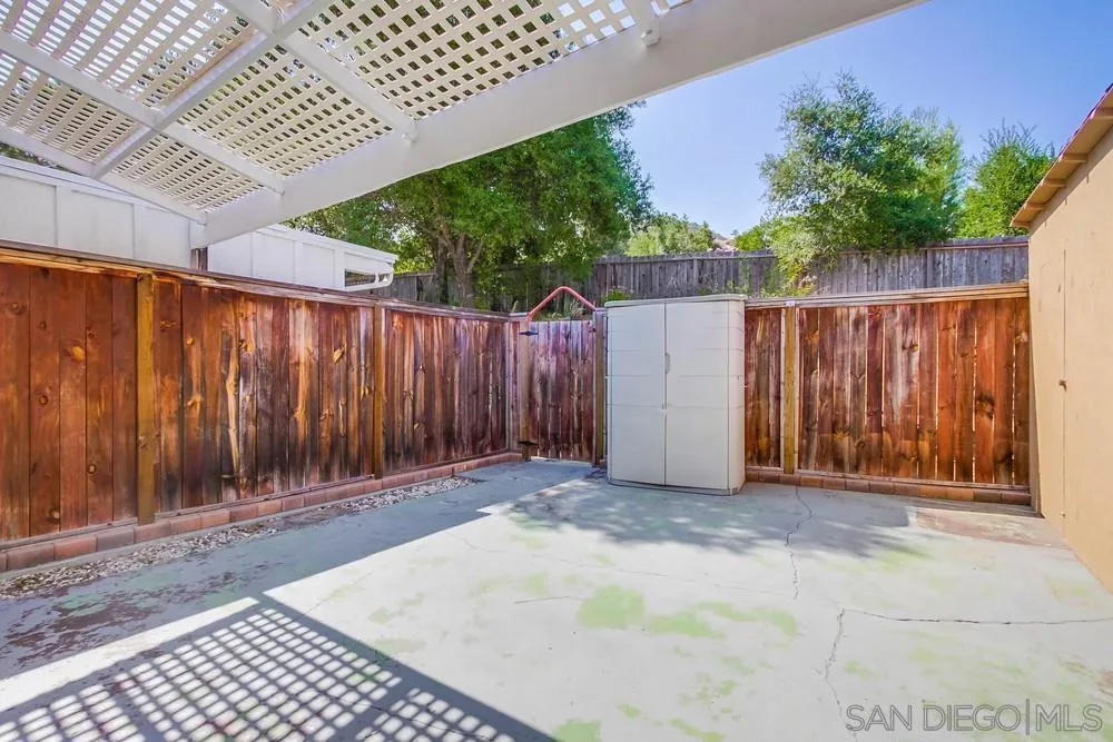 9075 Old Castle Road Valley Center, CA 92082 - Photo 27 of 32 a view of outdoor space with wooden fence