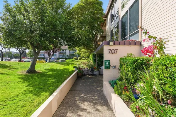 a view of building with garden