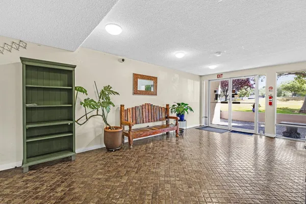 a view of a living room and entry way