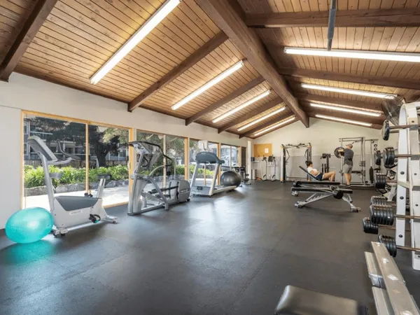 a view of parking garage with cars