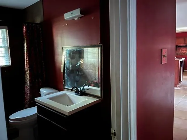 a bathroom with a sink and a toilet