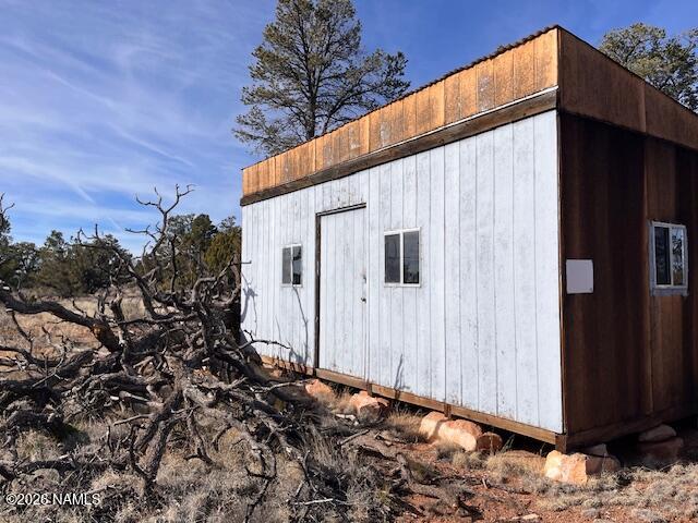5372 North Elk Run Road, Unit 191 Williams, AZ 86046 - Photo 6 of 9 a view of a house with a backyard