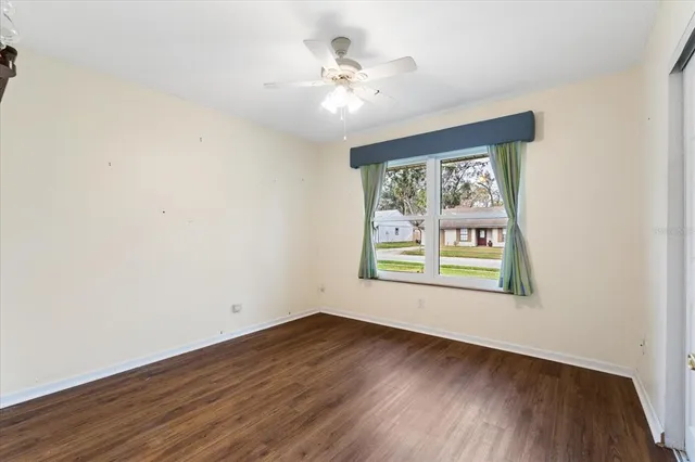 a bathroom with a sink toilet and a mirror