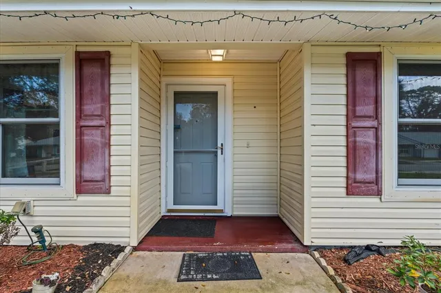 a view of a entryway door front of house