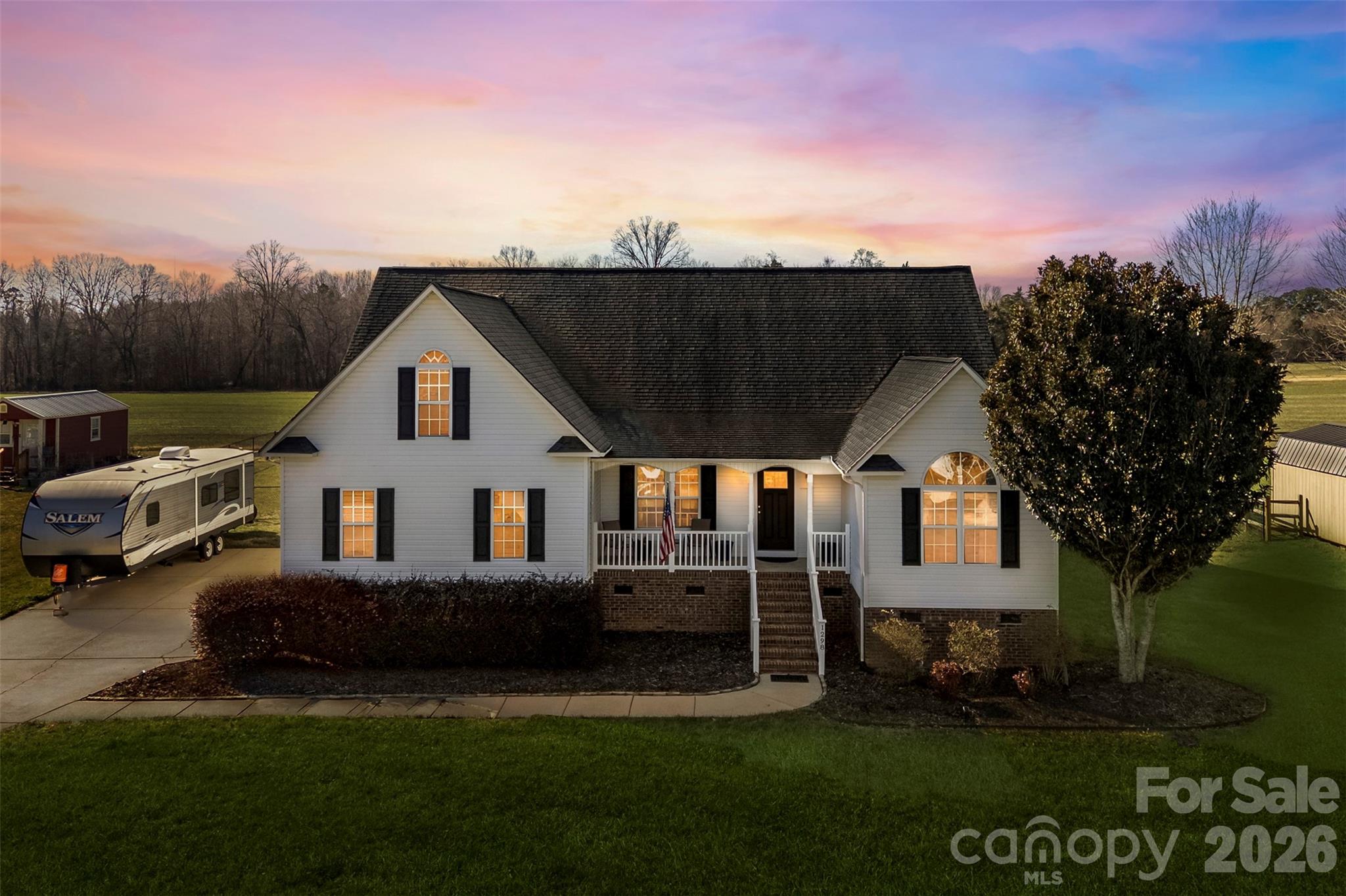 1298 Timber Spring Lane Salisbury, NC 28147 - Photo 1 of 34 a front view of a house with a yard