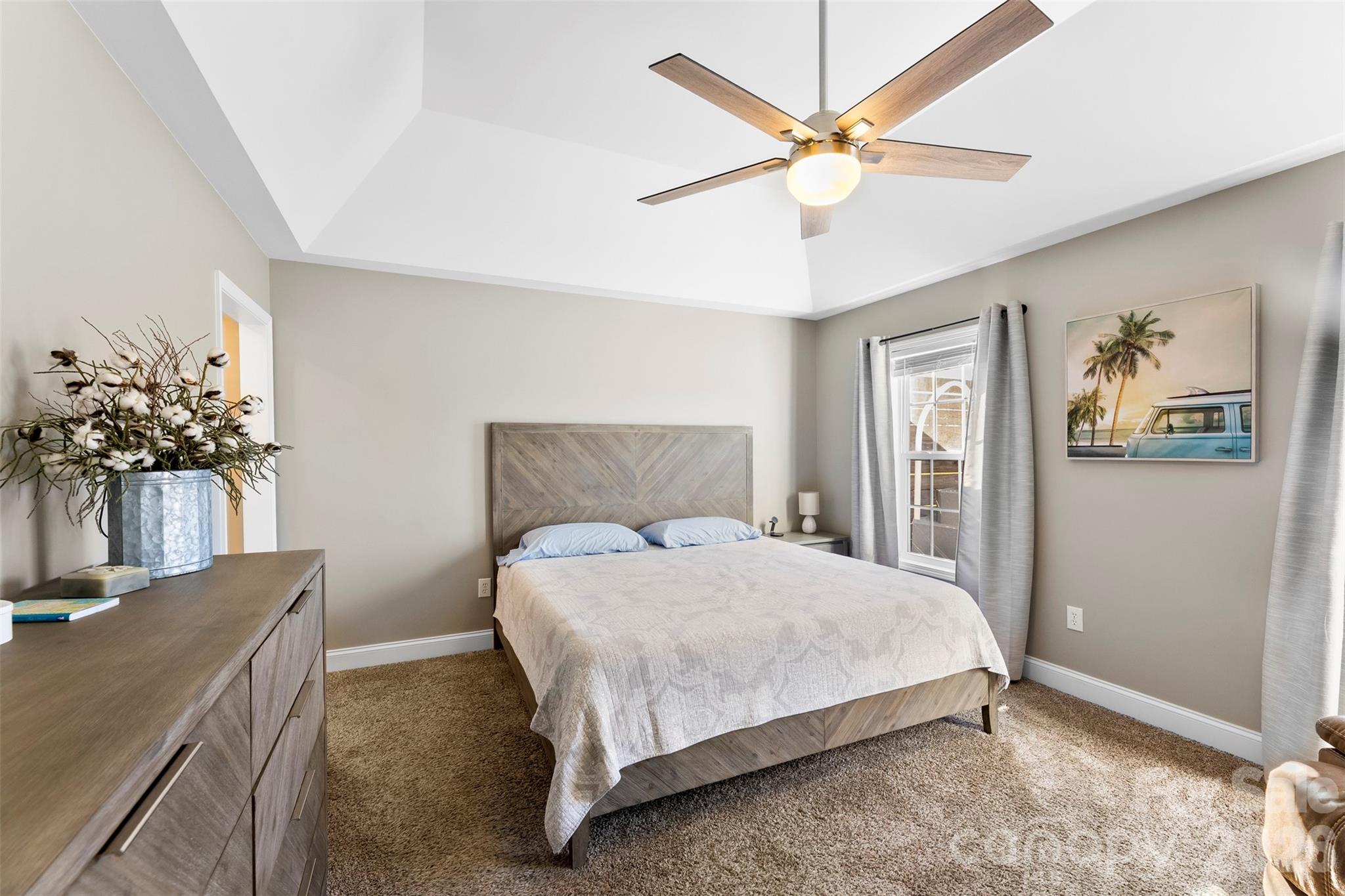1298 Timber Spring Lane Salisbury, NC 28147 - Photo 11 of 34 a bedroom with a bed table and a dresser