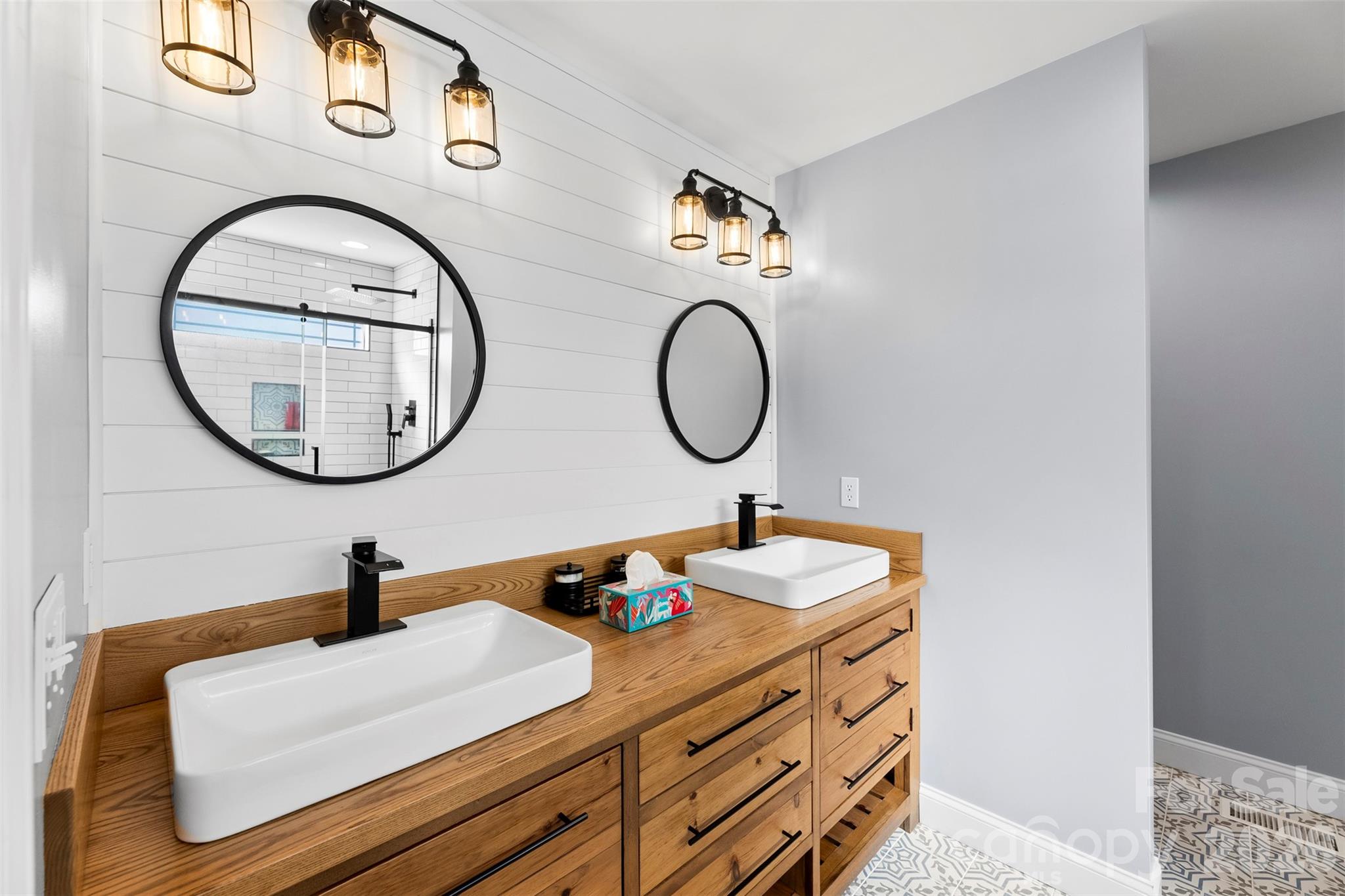1298 Timber Spring Lane Salisbury, NC 28147 - Photo 13 of 34 a bathroom with a sink and a mirror